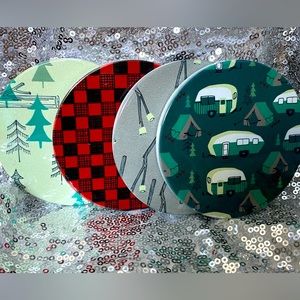 Four piece, ceramic coaster, set camping theme. Cork backing.